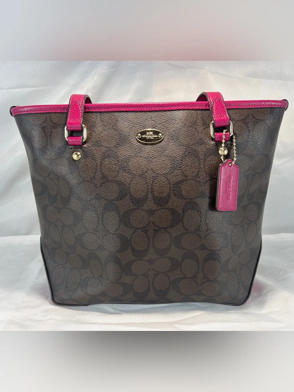 Coach Taylor Tote in Signature Canvas Style F58282 Mahogany/Fuchsia